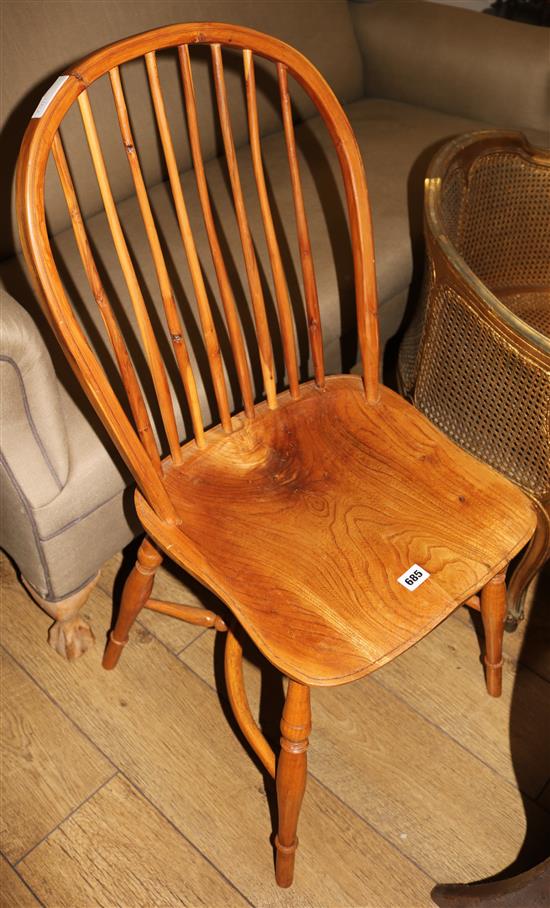 A yew and oak stick back chair